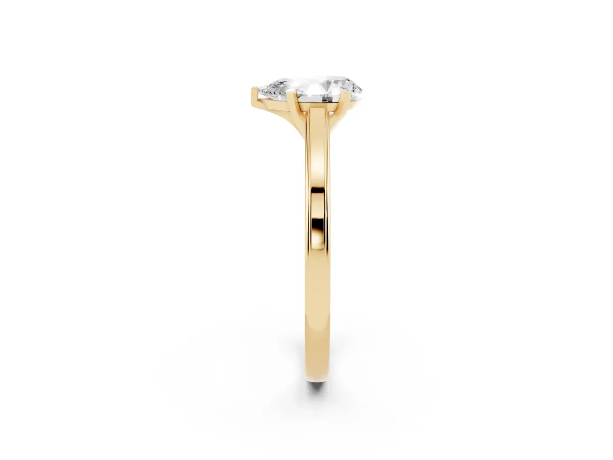 Pear Cut Solitaire Diamond Ring with Four-Prong Setting and Classic Band Yellow gold