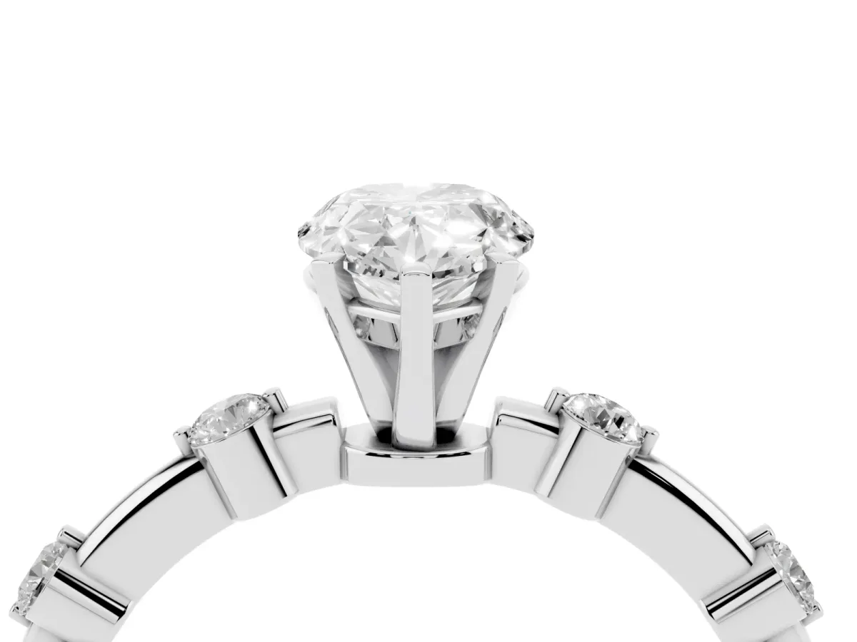 Pear Cut Solitaire Diamond Ring with Bezel Set Side Stones and Prong Setting White gold