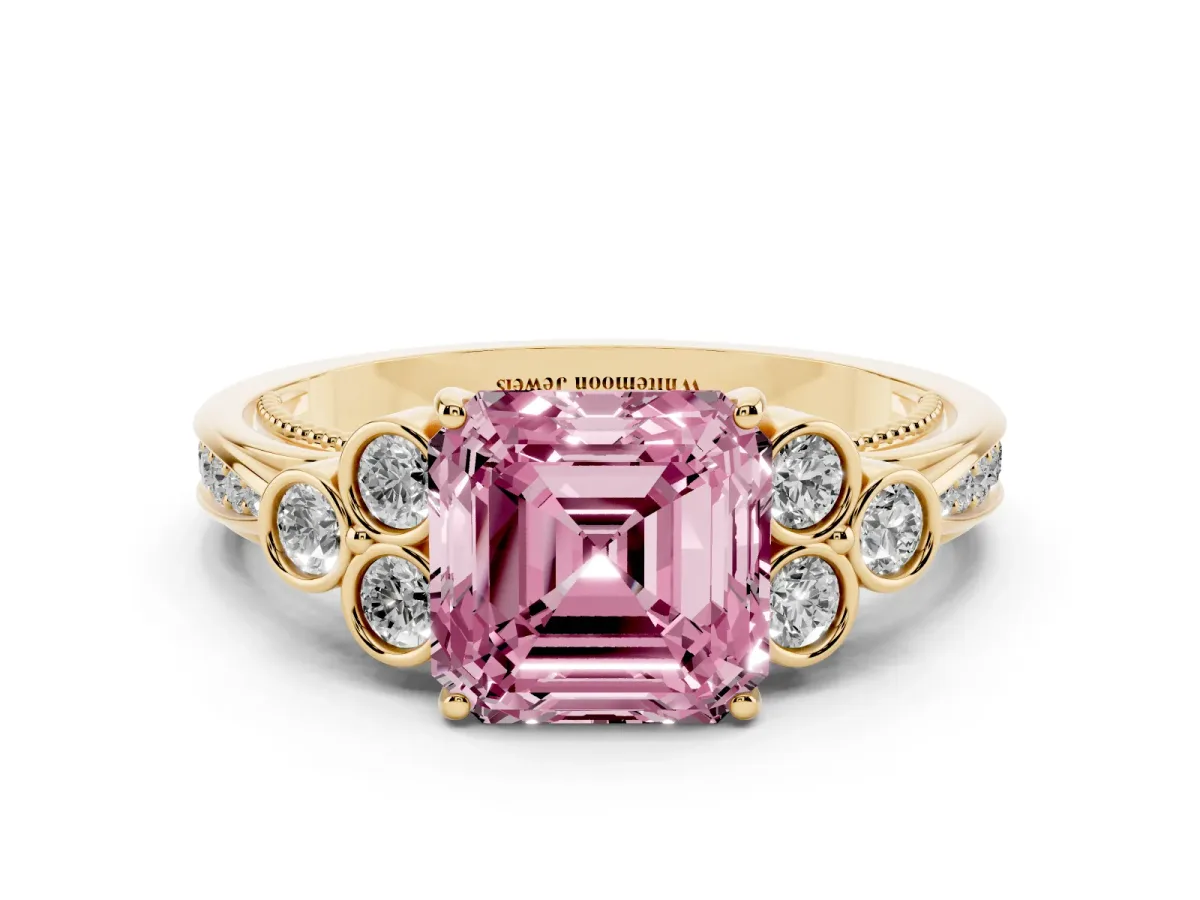 Fancy Pink Asscher Cut Cut Diamond Engagement Ring with Bezel Set Round Side Stones and Prong Setting Yellow gold