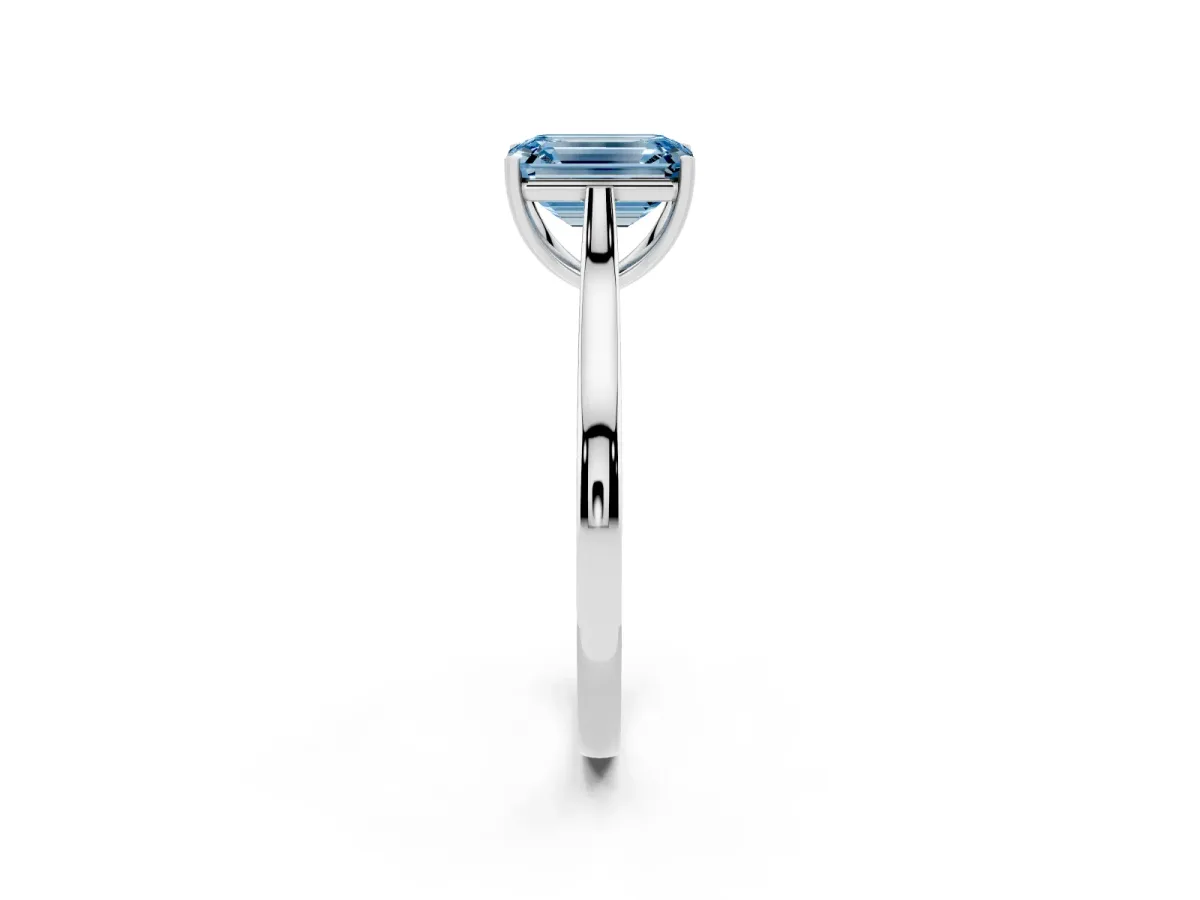 Fancy Blue Emerald Cut Solitaire Heart Prong Engagement Ring with Tapered Band Silver