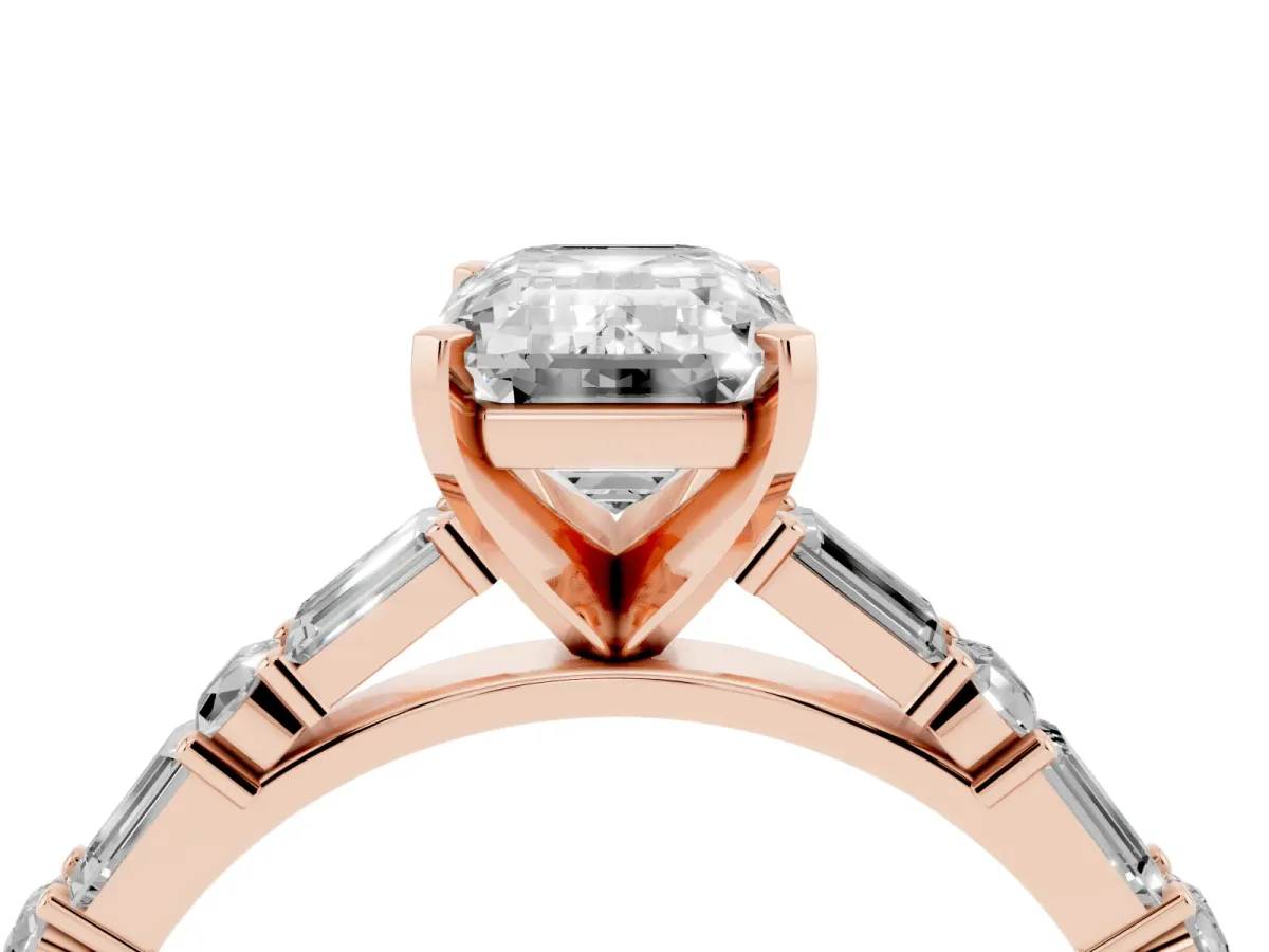 Emerald Cut Diamond Solitaire with Side Baguettes and Channel Set Band Rose gold