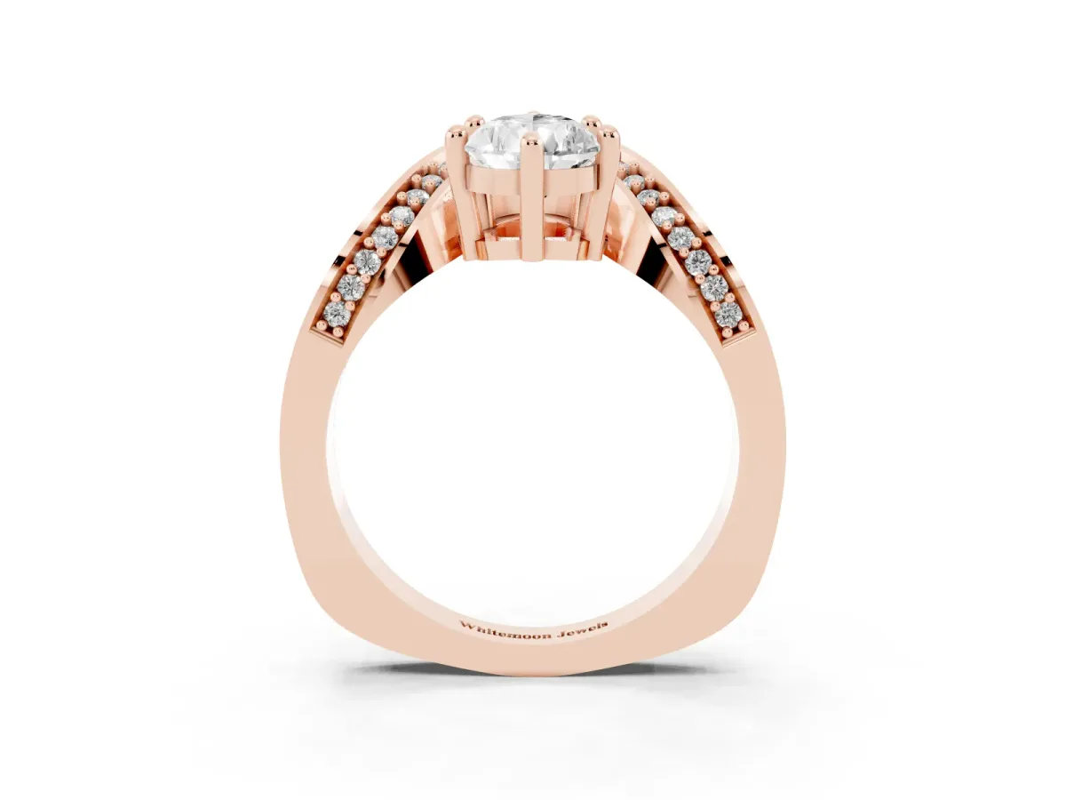 Pear Cut Solitaire Diamond Engagement Ring with Pave Band and Four-Prong Setting Rose gold