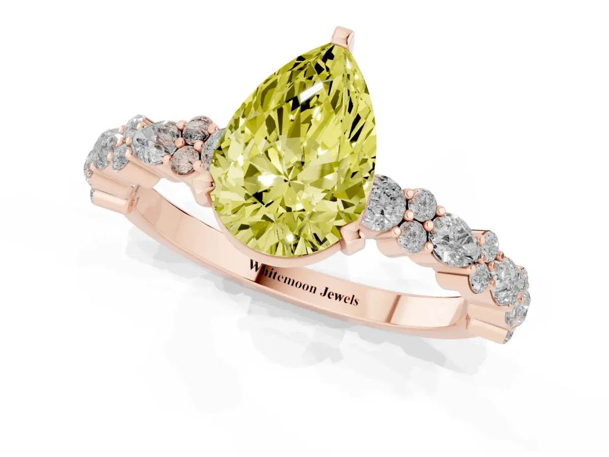 Fancy Yellow Pear Cut Diamond Side Stone Solitaire Ring with Round and Four-Prong Setting Rose gold