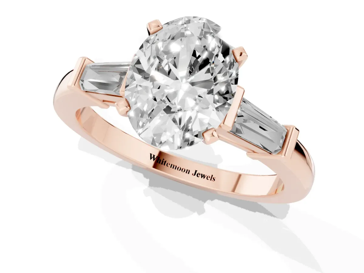 Oval Cut Cut Diamond Solitaire Ring with Tapered Baguette Accents and Four-Prong Setting Rose gold