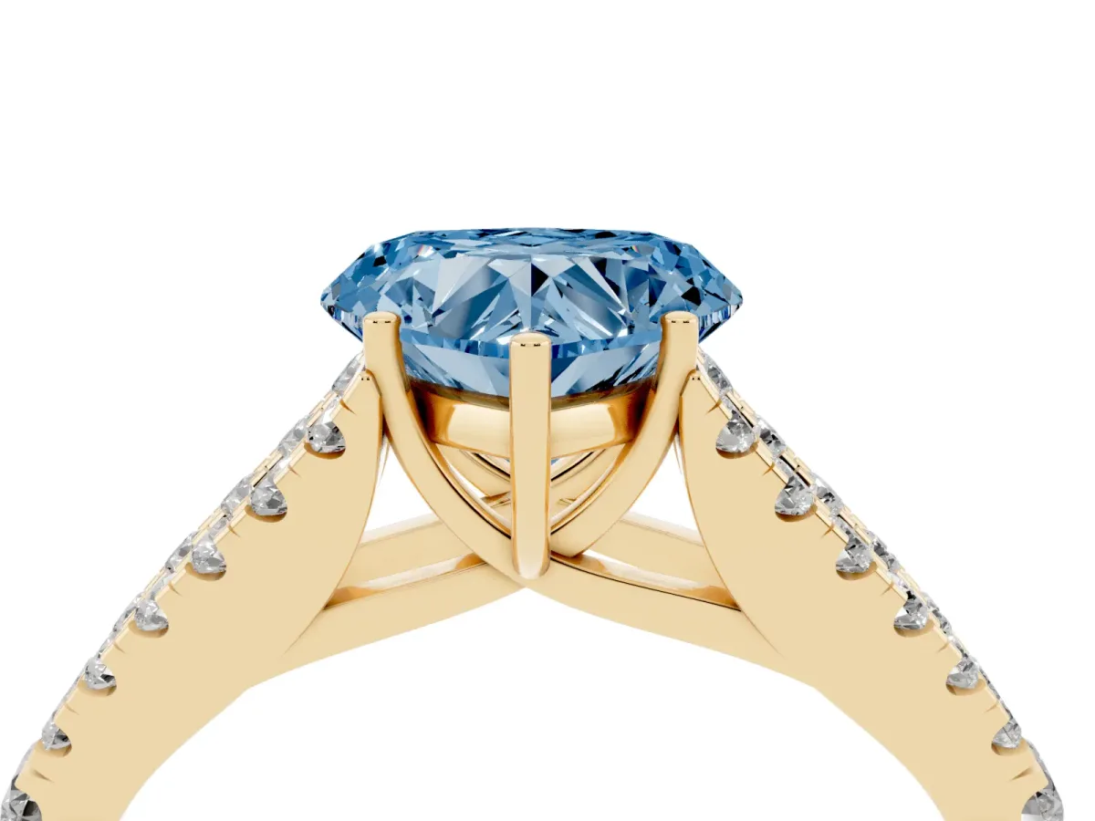 Fancy Blue Heart Cut Diamond Split Shank Engagement Ring with Round Pavé and Prong Setting Yellow gold