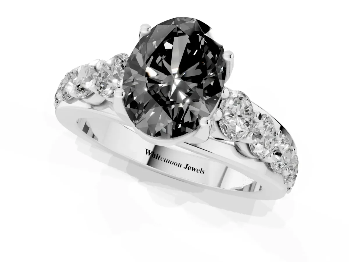 Fancy Black Oval Cut Diamond Engagement Ring with Pavé Band and Four-Prong Setting Silver