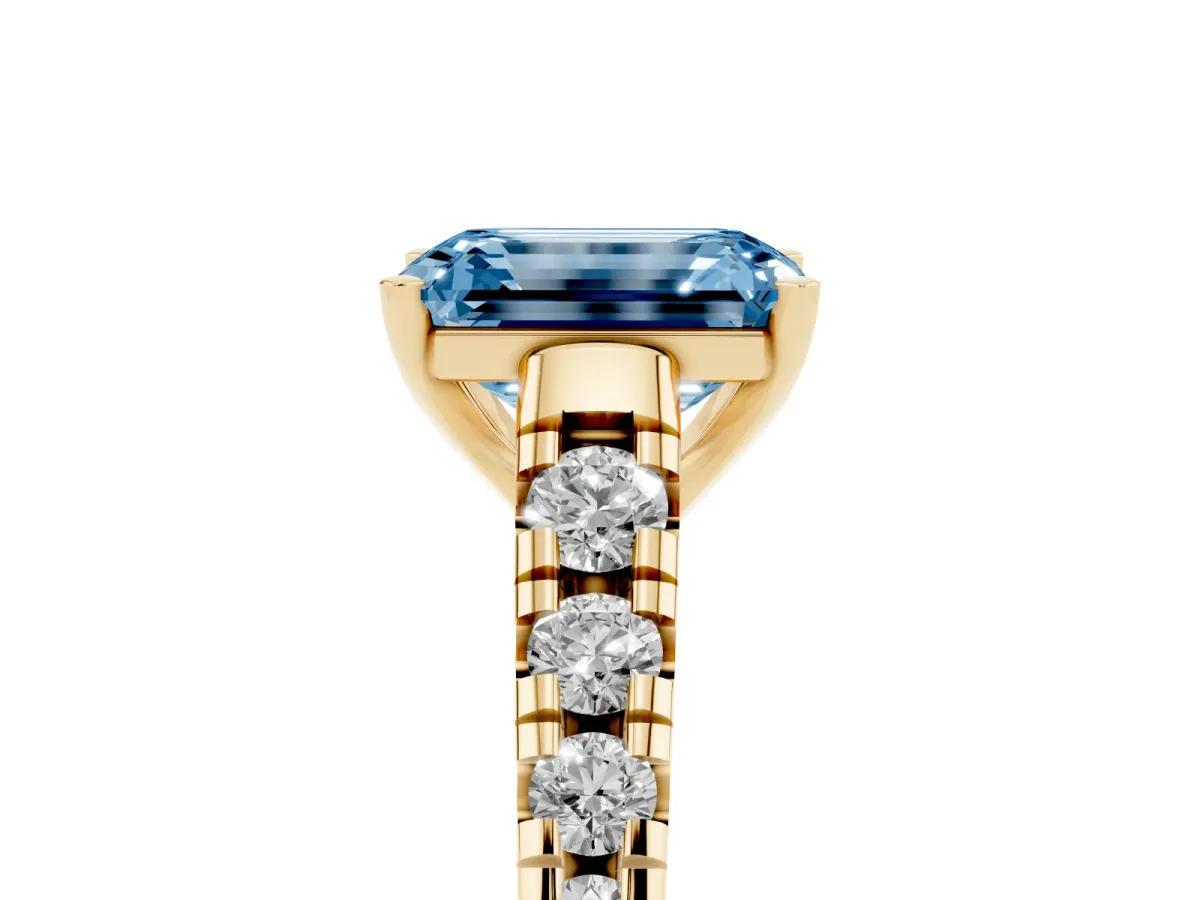 Fancy Blue Emerald Cut Diamond Cathedral Solitaire Ring with Round Pavé Band Yellow gold
