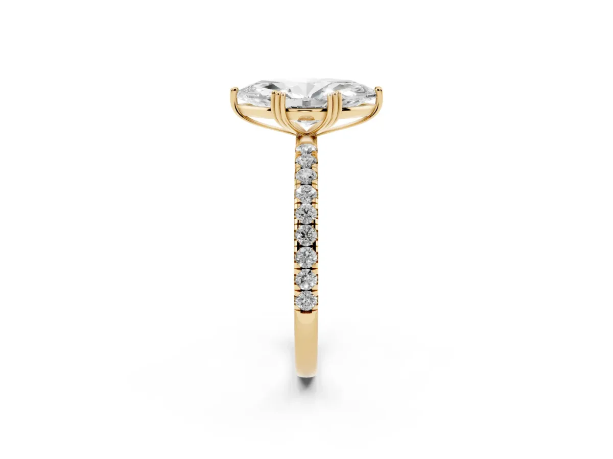 Marquise Cut Brilliant Solitaire with Pavé Band and Claw Prong Setting Yellow gold