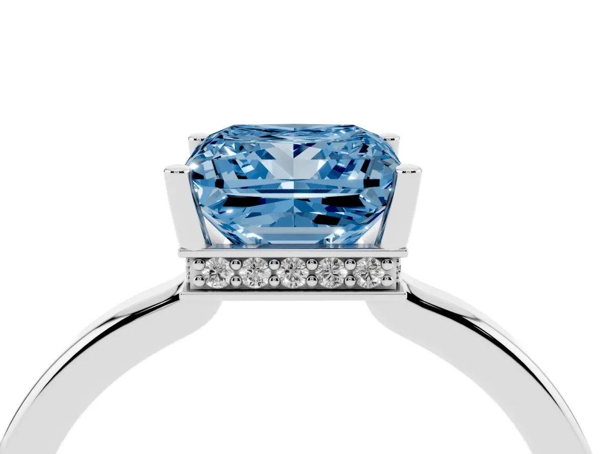 Fancy Blue Princess Cut Cut Solitaire Engagement Ring with Four-Prong Setting on a Classic Band Silver