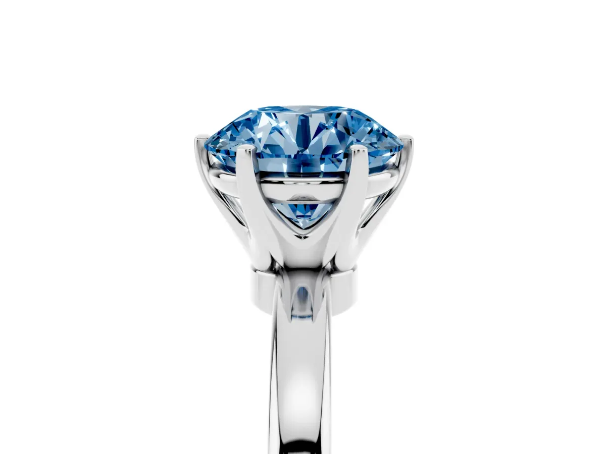 Fancy Blue Round Cut Solitaire Diamond Ring with Six-Prong Setting on a Classic Band Silver