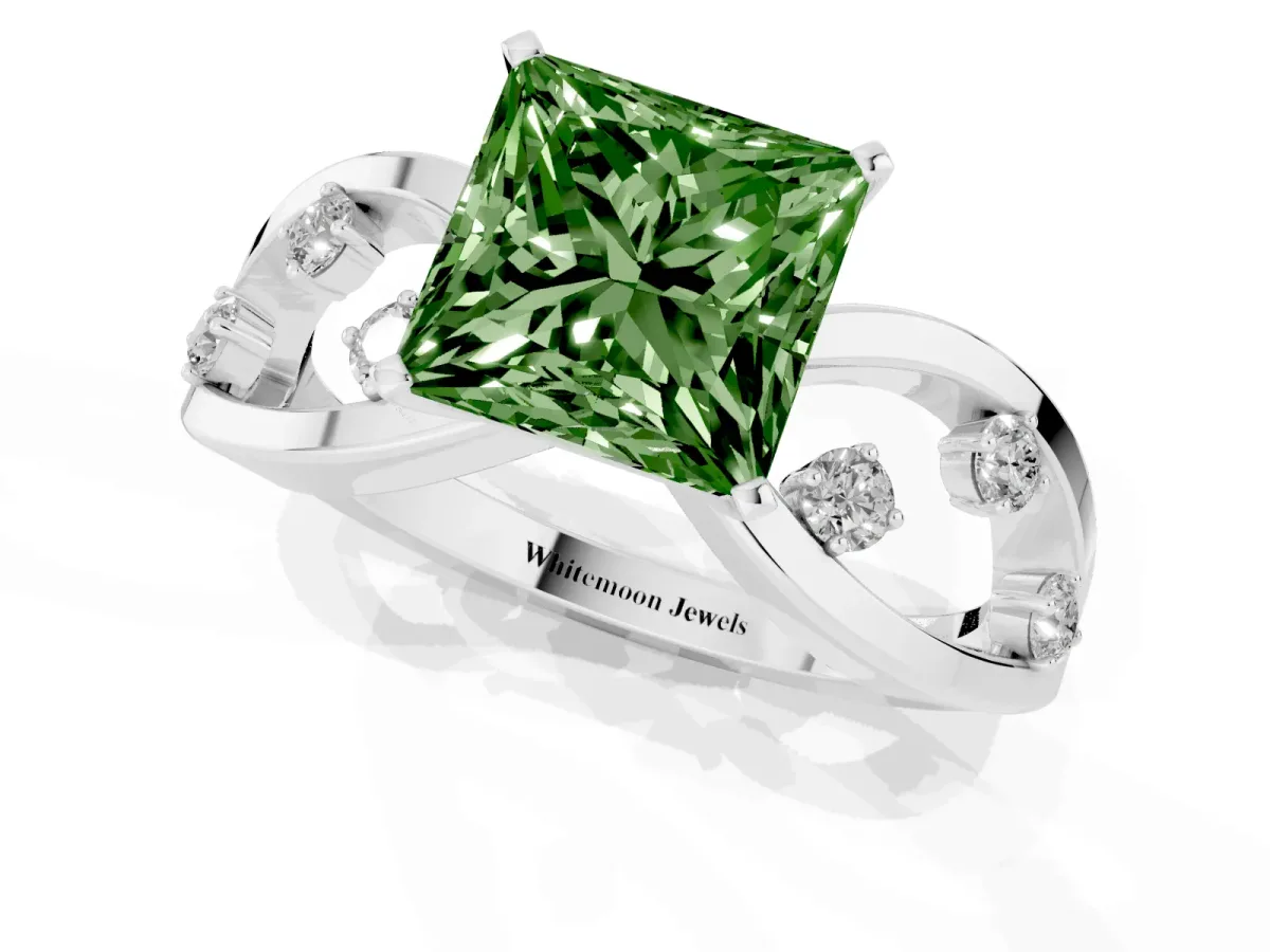 Fancy Green Princess Cut Cut Solitaire Diamond with Side Stones on Criss-Cross Band and Four-Prong Setting Silver
