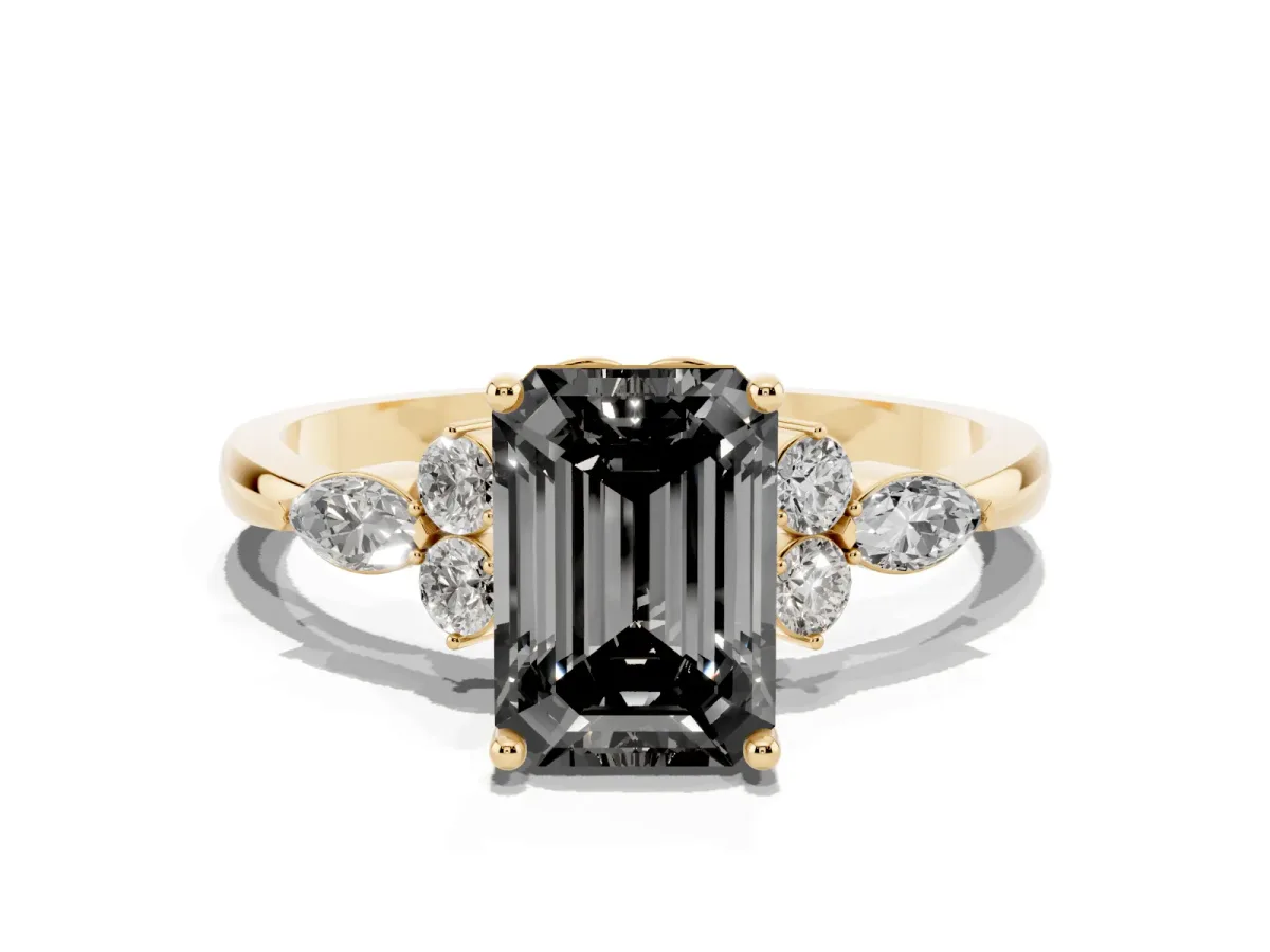 Fancy Black Emerald Cut Brilliant Diamond Solitaire Ring with Pear Side Stones and Four-Prong Setting Yellow gold