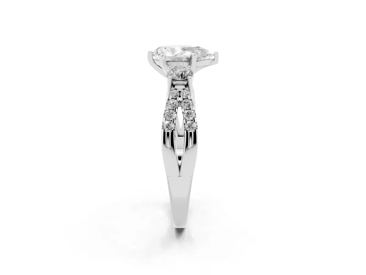 Pear Cut Diamond Three-Stone Ring with Pavé Split Shank and Four-Prong Setting Platinum