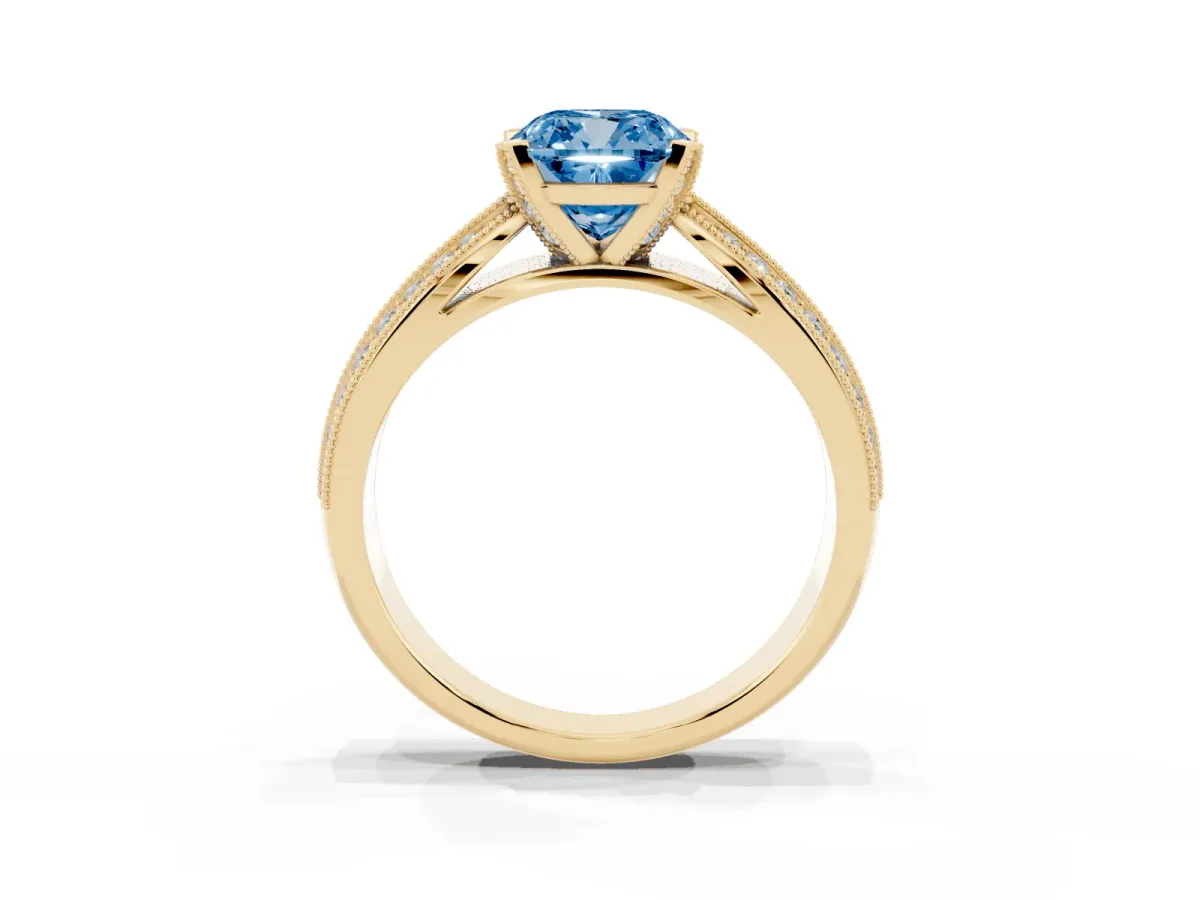 Fancy Blue Cushion Cut Diamond Solitaire Ring with Milgrain Round Pavé Band and Prong Setting Yellow gold