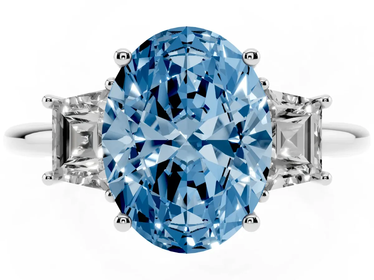 Fancy Blue Oval Cut Diamond Three-Stone Ring with Trapezoid Side Stones and Prong Setting Silver