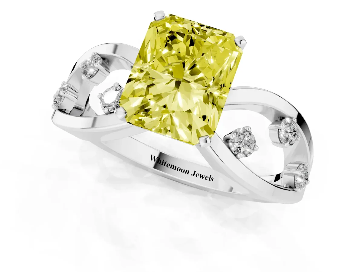 Fancy Yellow Radiant Cut Cut Solitaire Diamond with Side Stones on Criss-Cross Band and Four-Prong Setting Platinum