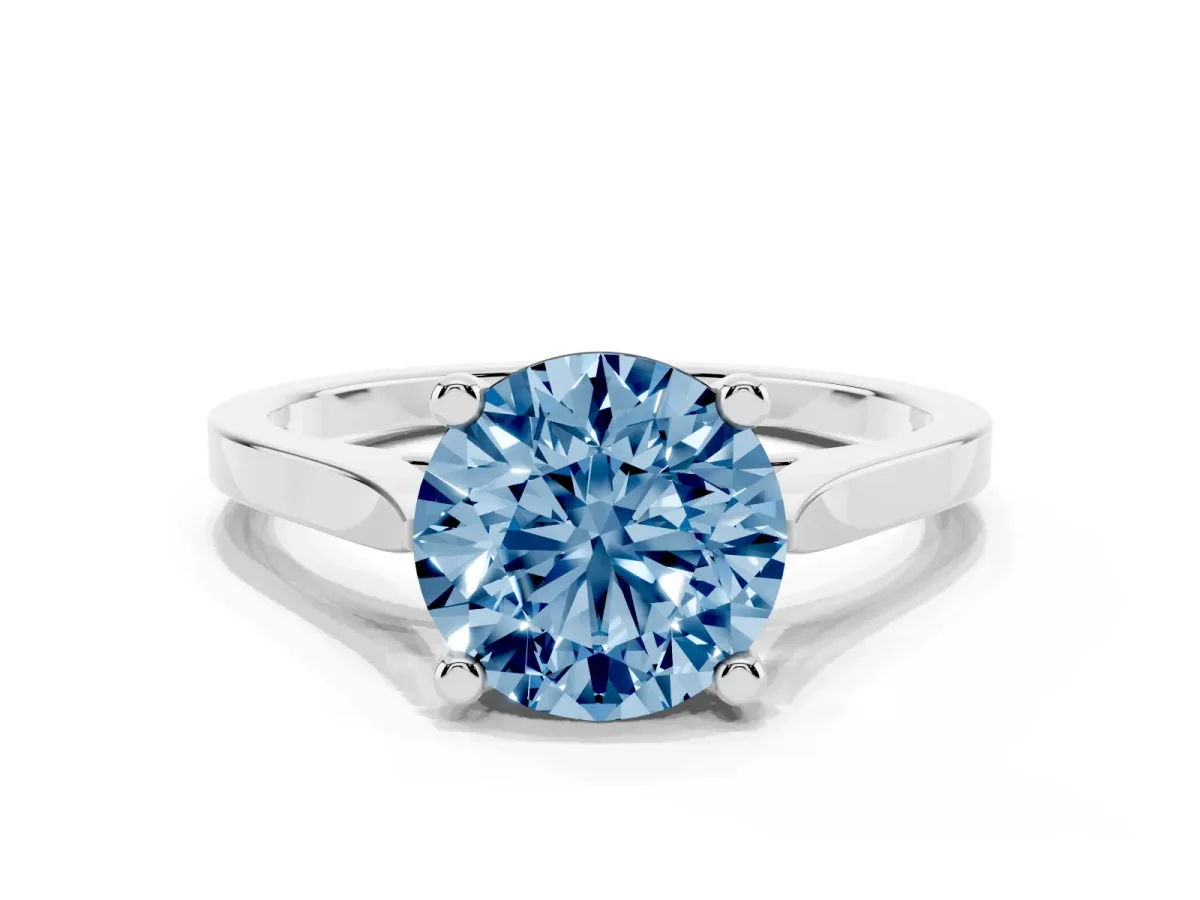 Fancy Blue Round Cut Solitaire Diamond Ring with Four-Prong Setting and Tapered Band Platinum