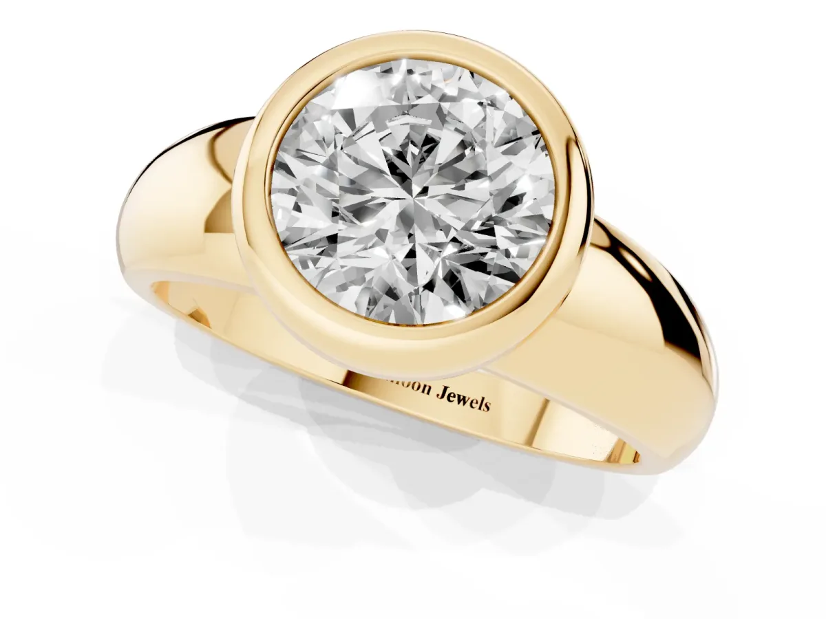 Bezel Set Round Cut Solitaire Ring with Wide Band Yellow gold