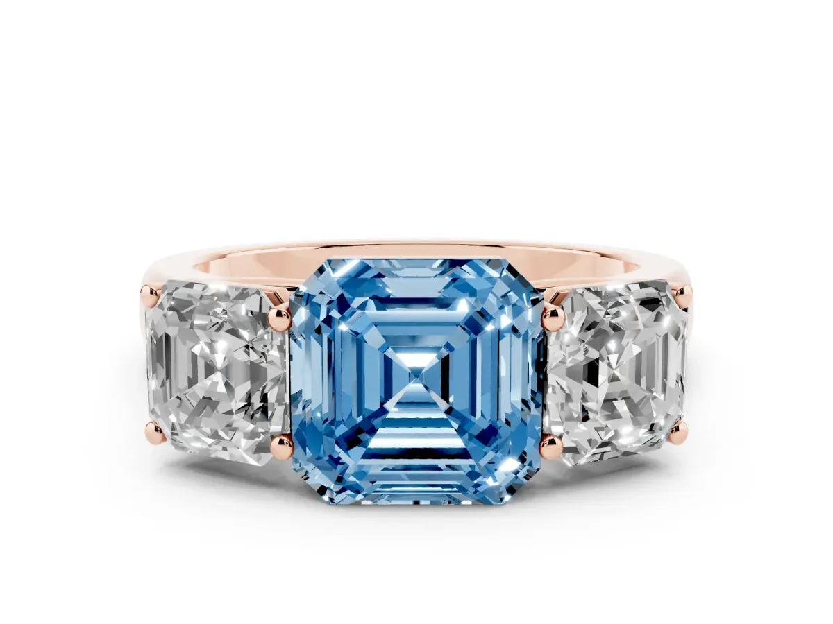 Fancy Blue Asscher Cut Three-Stone Diamond Ring with Prong Setting on a Classic Band Rose gold