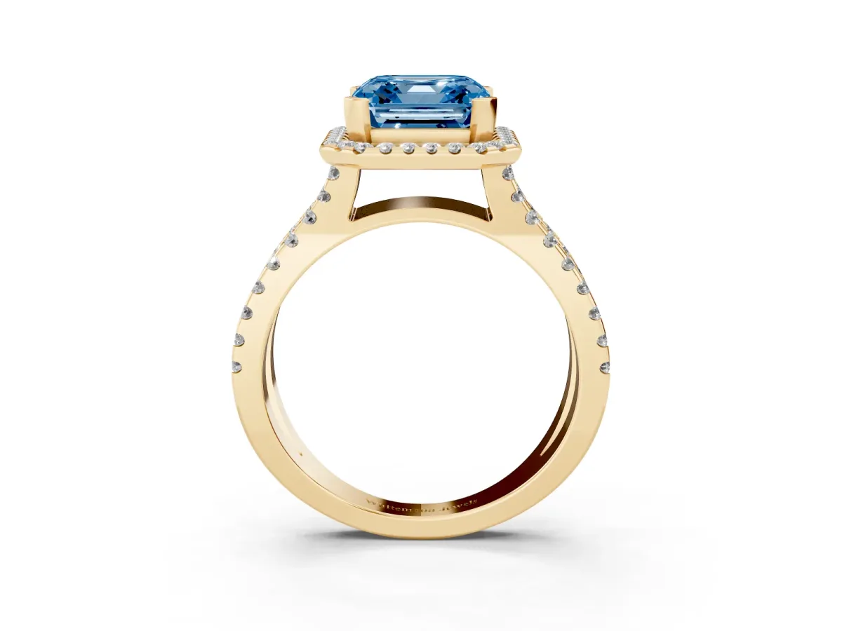 Fancy Blue Asscher Cut Diamond Halo Ring with Split Shank Pavé Band and Prong Setting Yellow gold