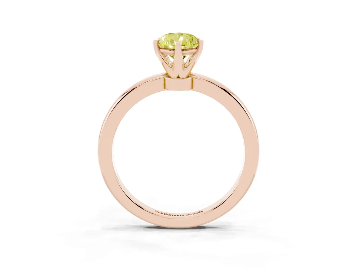 Fancy Yellow Pear Cut Solitaire Diamond Ring with Six-Prong Setting on a Classic Band Rose gold