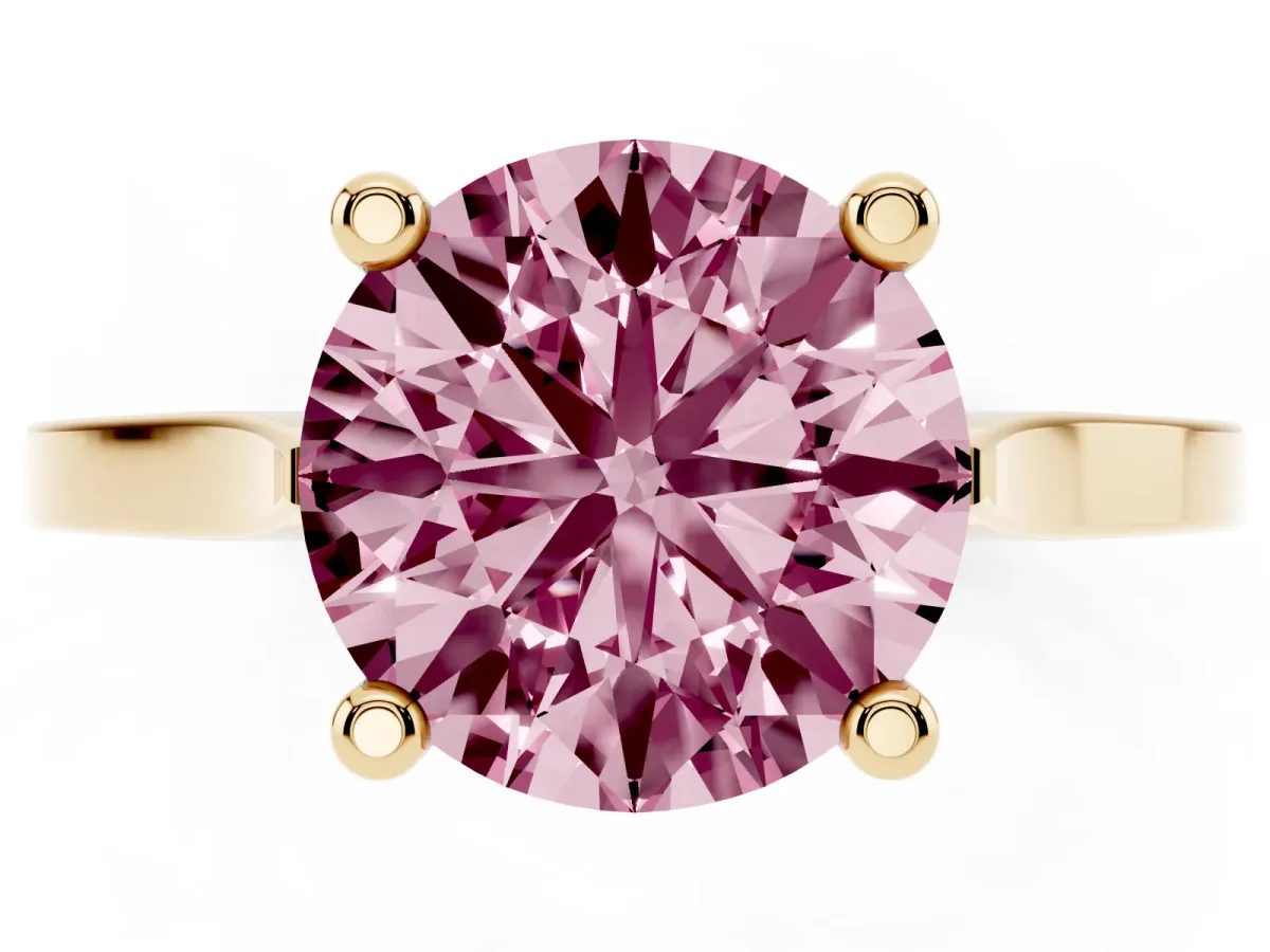 Fancy Pink Round Cut Solitaire Diamond Ring with Four-Prong Setting and Tapered Band Yellow gold