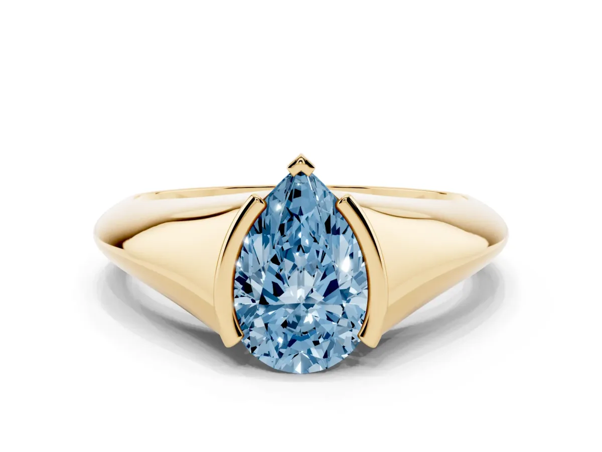 Fancy Blue Pear Cut Solitaire Tension Set Diamond Ring Yellow gold
