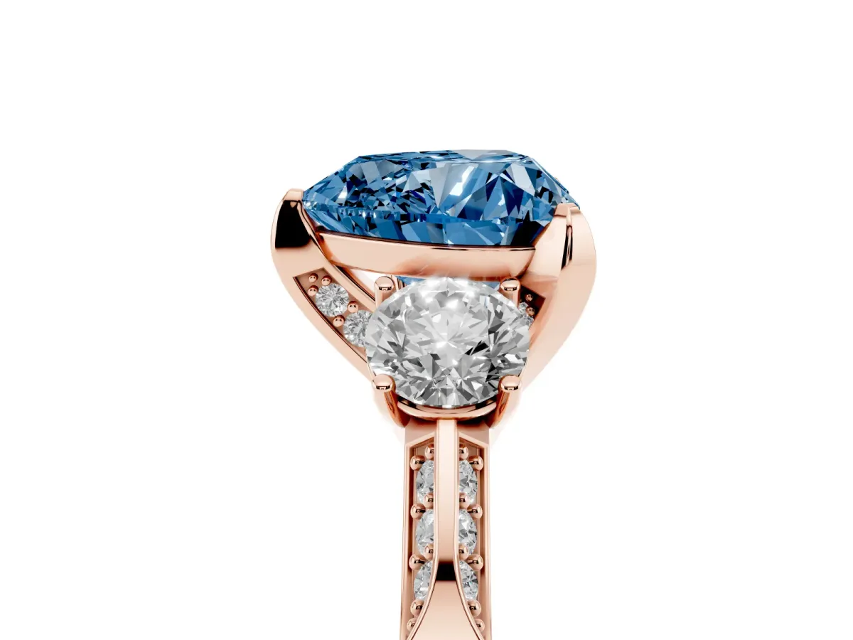 Fancy Blue Heart Cut Brilliant Three-Stone Diamond Ring with Pavé Band and Four-Prong Setting Rose gold