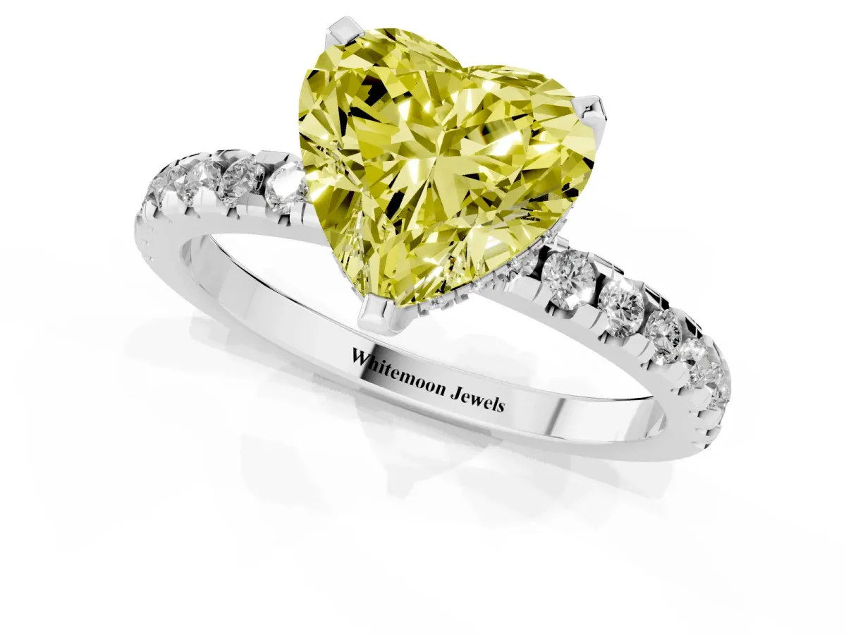 Fancy Yellow Heart Cut Diamond Solitaire Ring with Round Pavé Band and Four-Prong Setting Silver