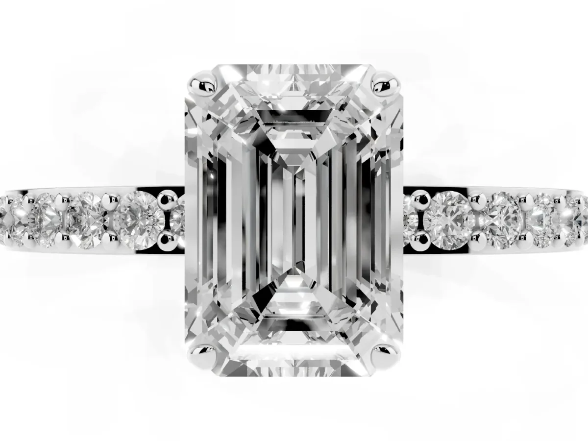 Emerald Cut Diamond Pavé Engagement Ring with Round Accents and Prong Setting Platinum