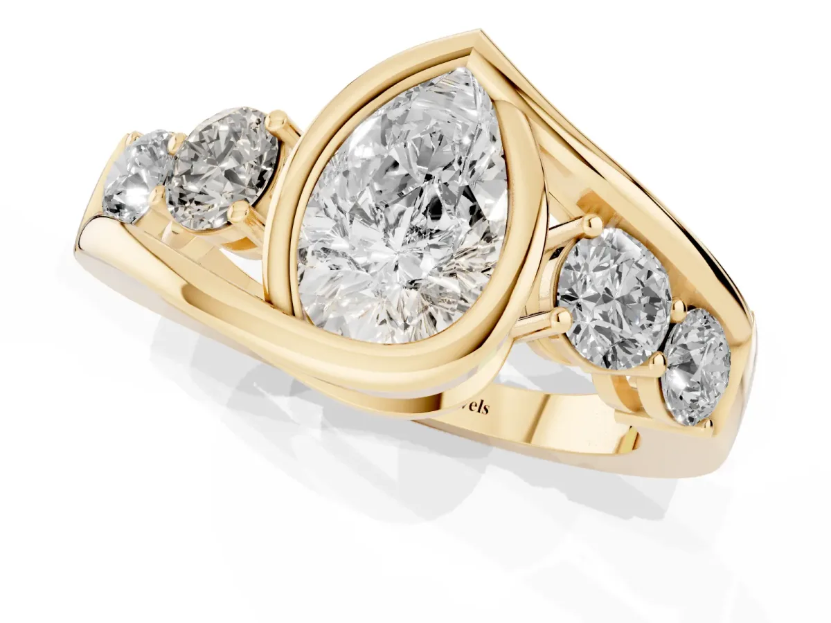 Bezel Set Pear Cut Diamond Bypass Ring with Round Accents Yellow gold