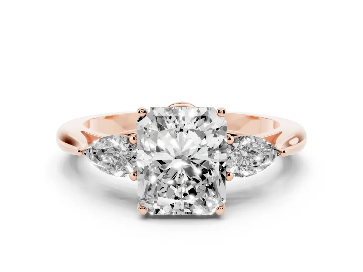 Three-Stone Radiant Cut Brilliant Diamond Solitaire Ring with Tapered Band and Four-Prong Setting Rose gold