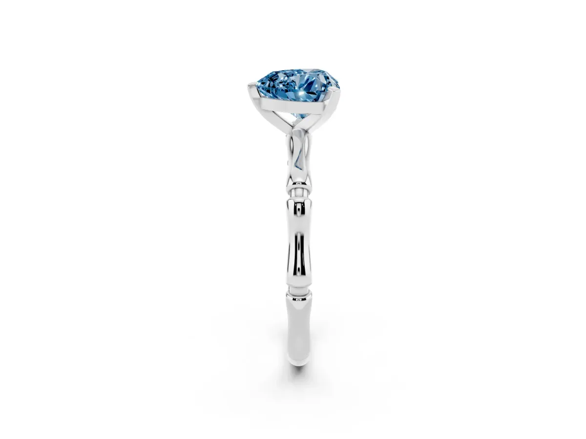 Fancy Blue Heart Cut Solitaire Diamond Ring with Bamboo Band and Four-Prong Setting Silver