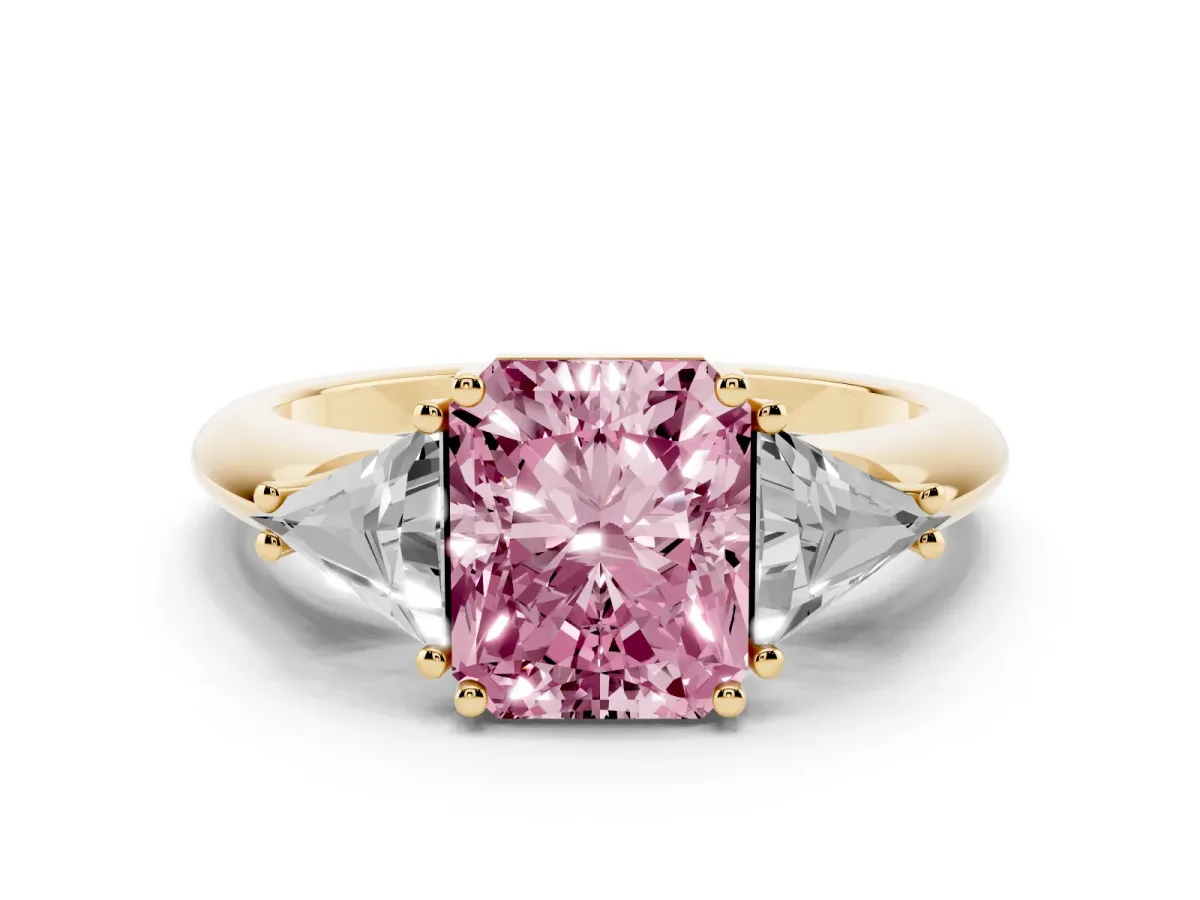 Fancy Pink Three-Stone Radiant Cut Diamond Engagement Ring with Trillion Side Stones and Prong Setting Yellow gold