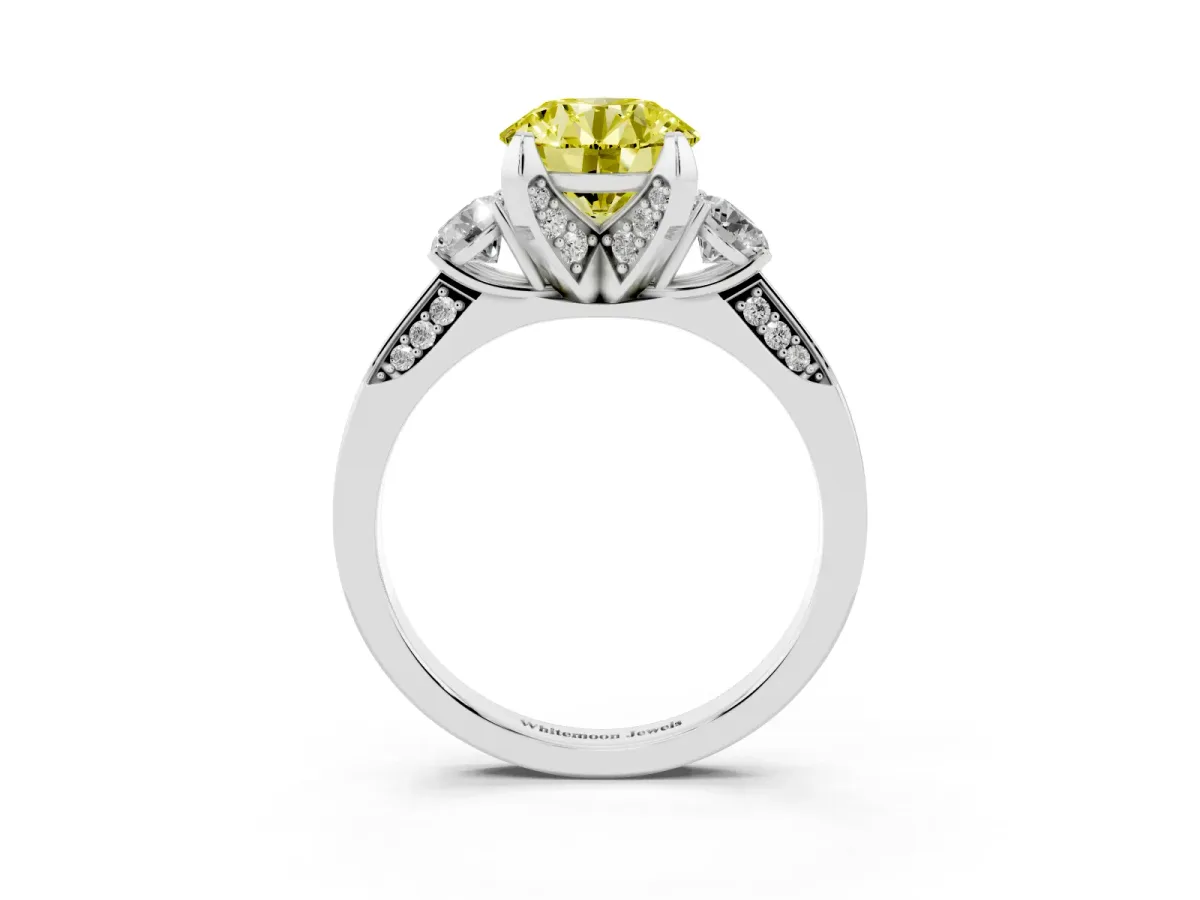 Fancy Yellow Round Cut Brilliant Three-Stone Diamond Ring with Pavé Band and Four-Prong Setting Platinum