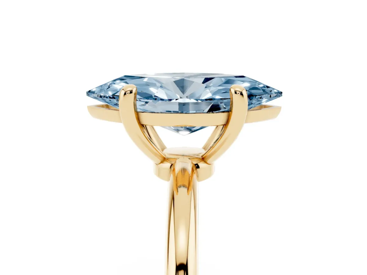 Fancy Blue Marquise Cut Solitaire Diamond Ring with 4-Prong Setting on a Classic Band Yellow gold