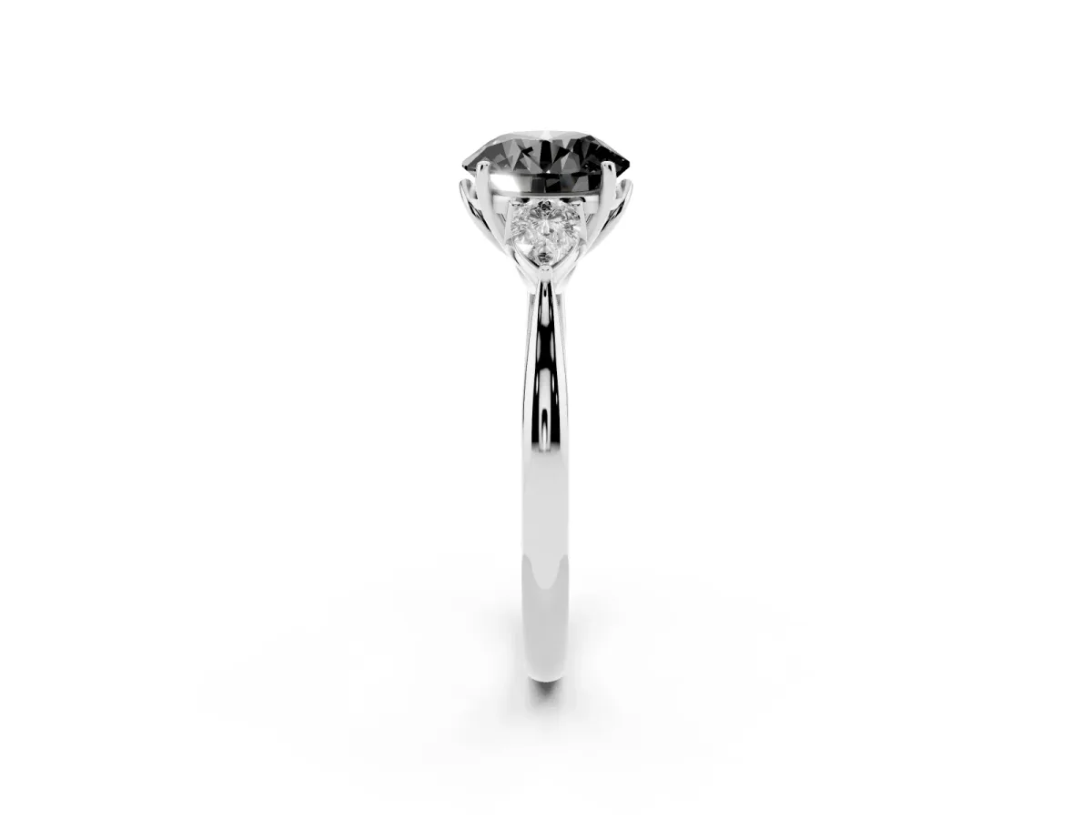 Fancy Black Three-Stone Round Cut Brilliant Diamond Solitaire Ring with Tapered Band and Four-Prong Setting Platinum