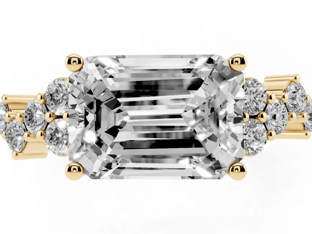 Emerald Cut Diamond Scattered Round Accent Ring with Prong Setting Yellow gold