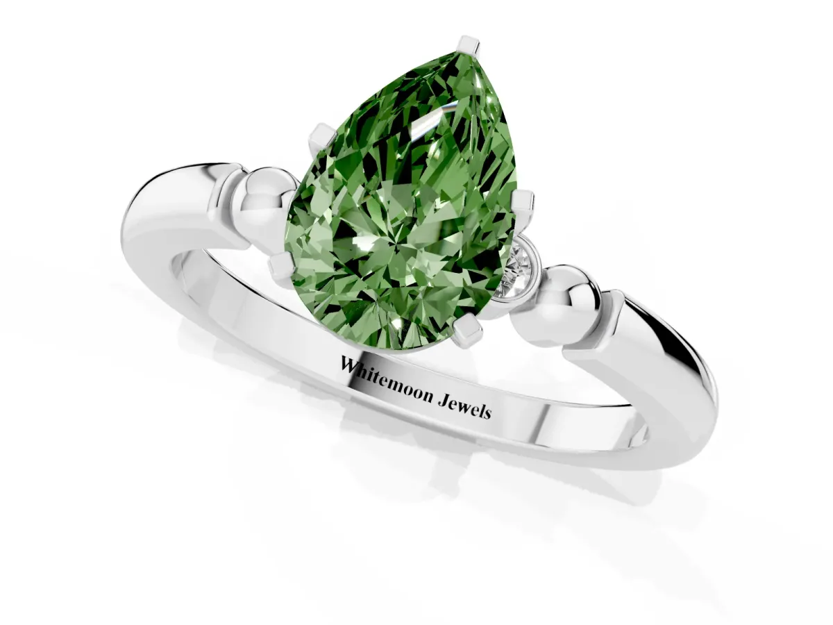 Fancy Green Pear Cut Solitaire Beaded Band with Four-Prong Setting Silver