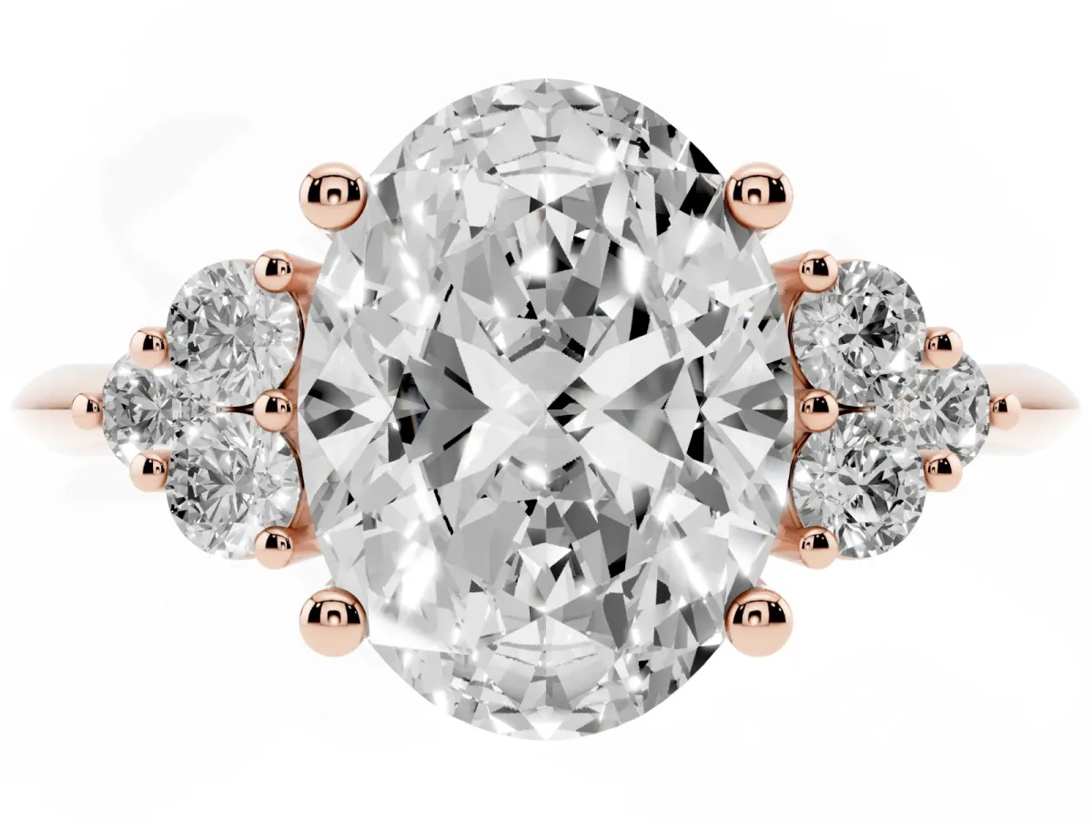 Oval Cut Cut Diamond Cluster Ring with Solitaire Band and Four-Prong Setting Rose gold