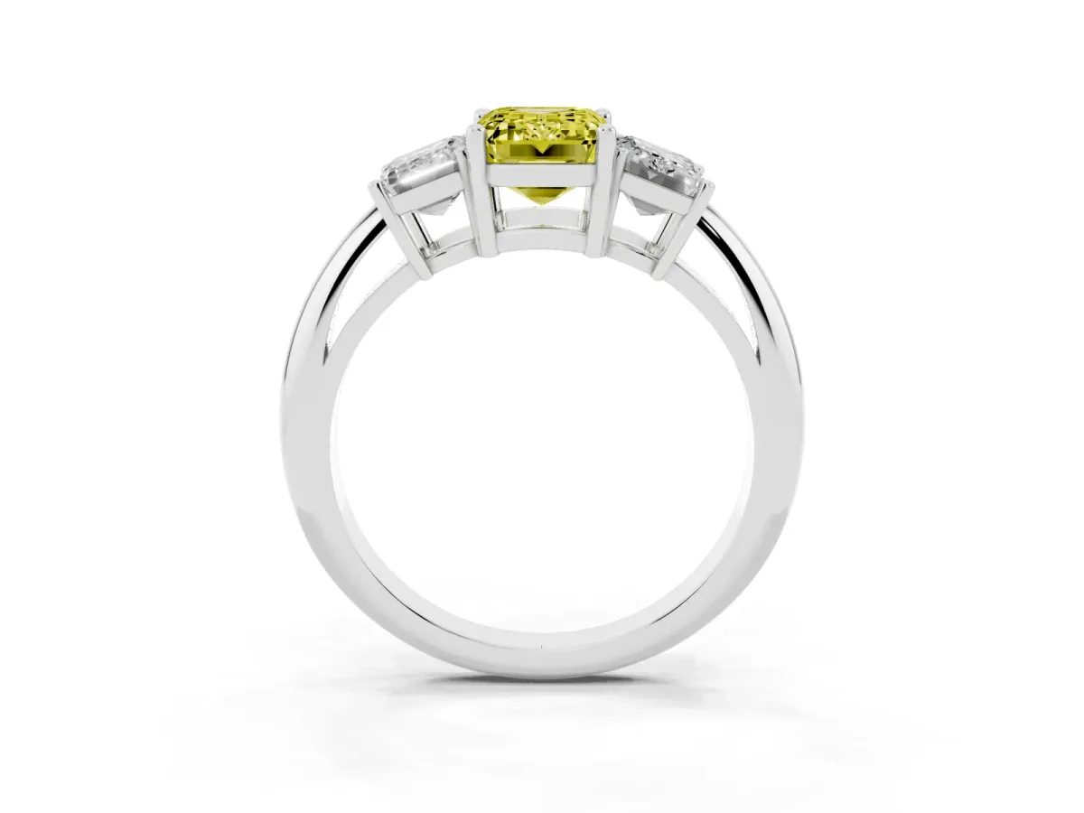 Fancy Yellow Three-Stone Emerald Cut Cut Diamond Engagement Ring with Prong Setting on a White Gold Band Platinum