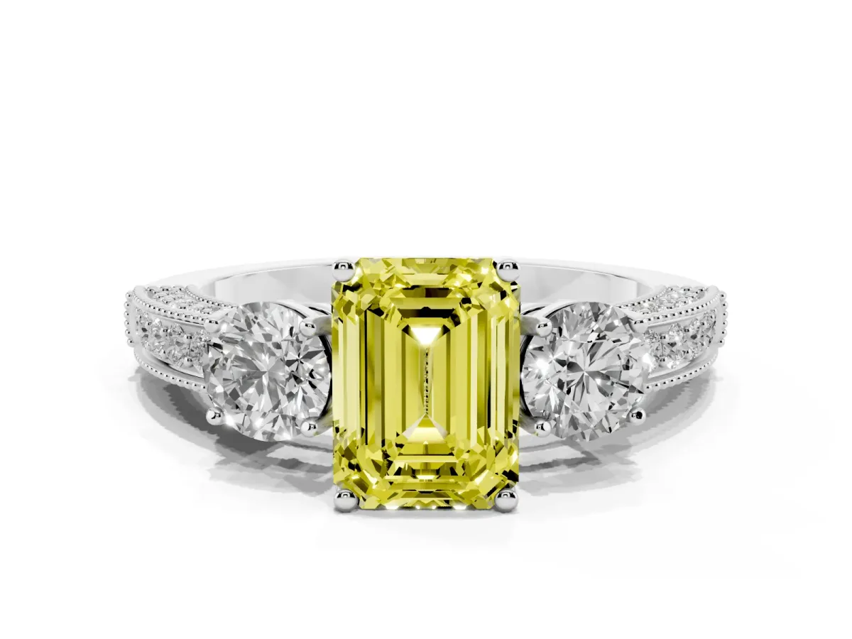 Fancy Yellow Emerald Cut Three-Stone Diamond Ring with Pavé Band and Four-Prong Setting Platinum