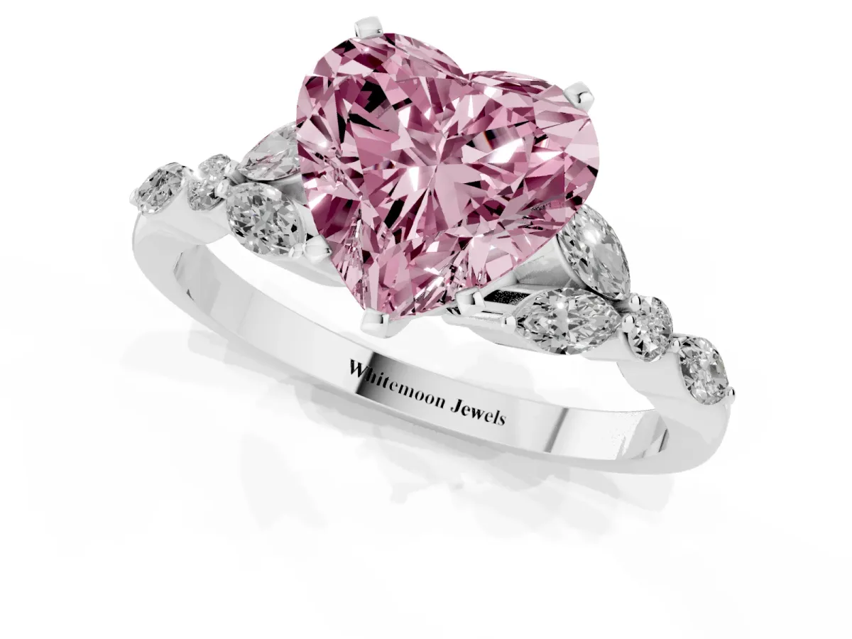 Fancy Pink Heart Cut Diamond Solitaire Ring with Side Stones and Four-Prong Setting Silver