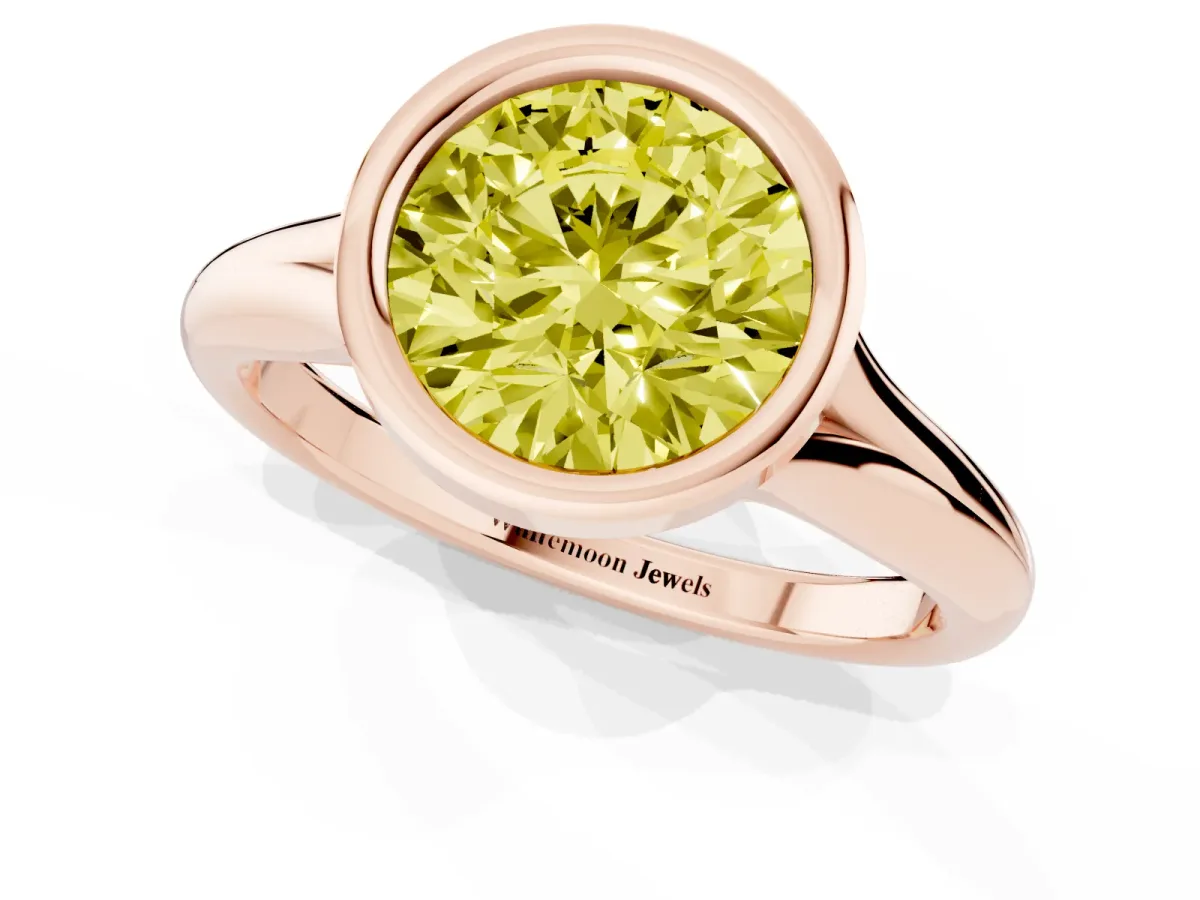 Fancy Yellow Bezel Set Round Cut Solitaire Diamond Ring with Smooth Band Rose gold