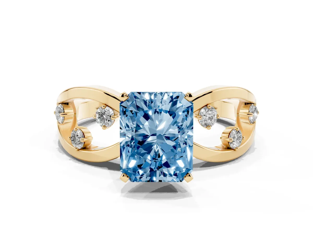 Fancy Blue Radiant Cut Cut Solitaire Diamond with Side Stones on Criss-Cross Band and Four-Prong Setting Yellow gold