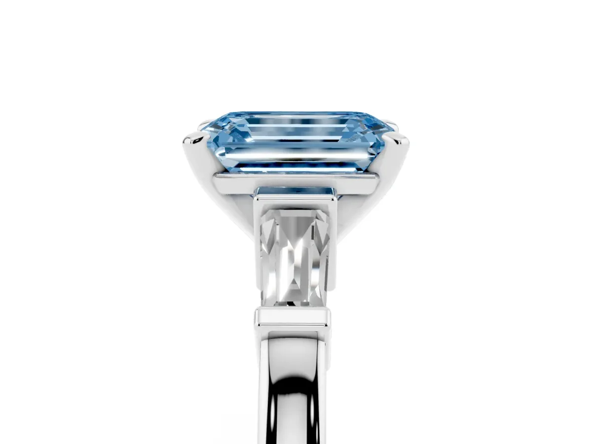 Fancy Blue Emerald Cut Cut Diamond Solitaire Ring with Tapered Baguette Accents and Four-Prong Setting Silver