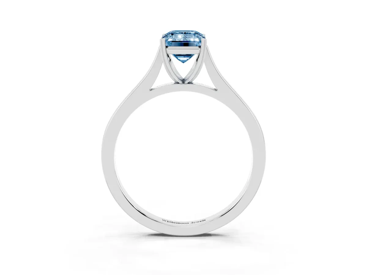 Fancy Blue Emerald Cut Solitaire Heart Prong Engagement Ring with Tapered Band Silver