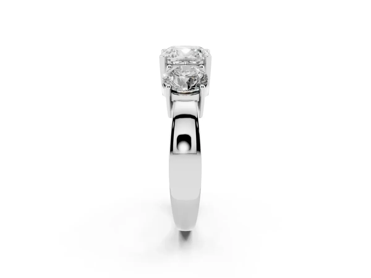 Three-Stone Cushion Cut Diamond Ring with Round Side Stones, Classic Band, and Four-Prong Setting Silver