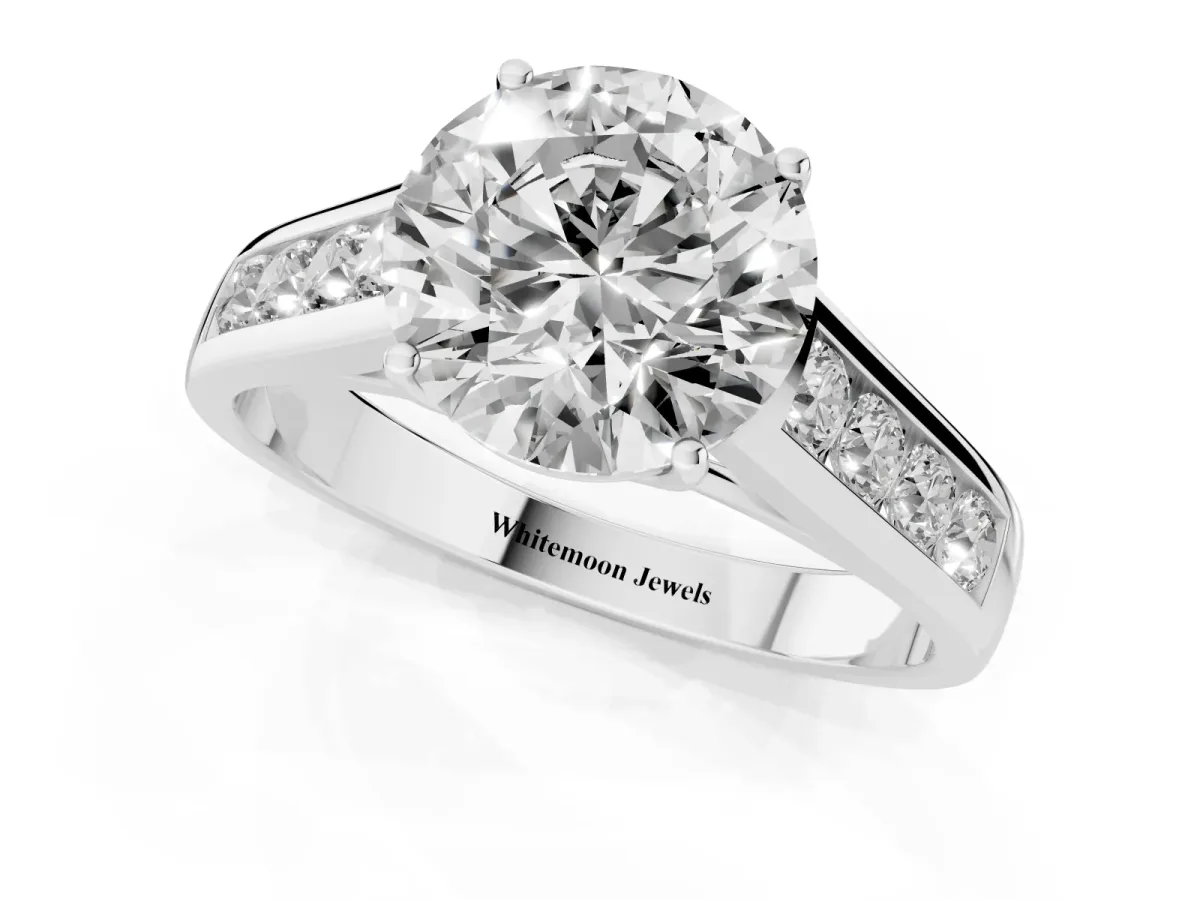 Round Cut Brilliant Channel-Set Solitaire Ring with Four-Prong Setting Platinum