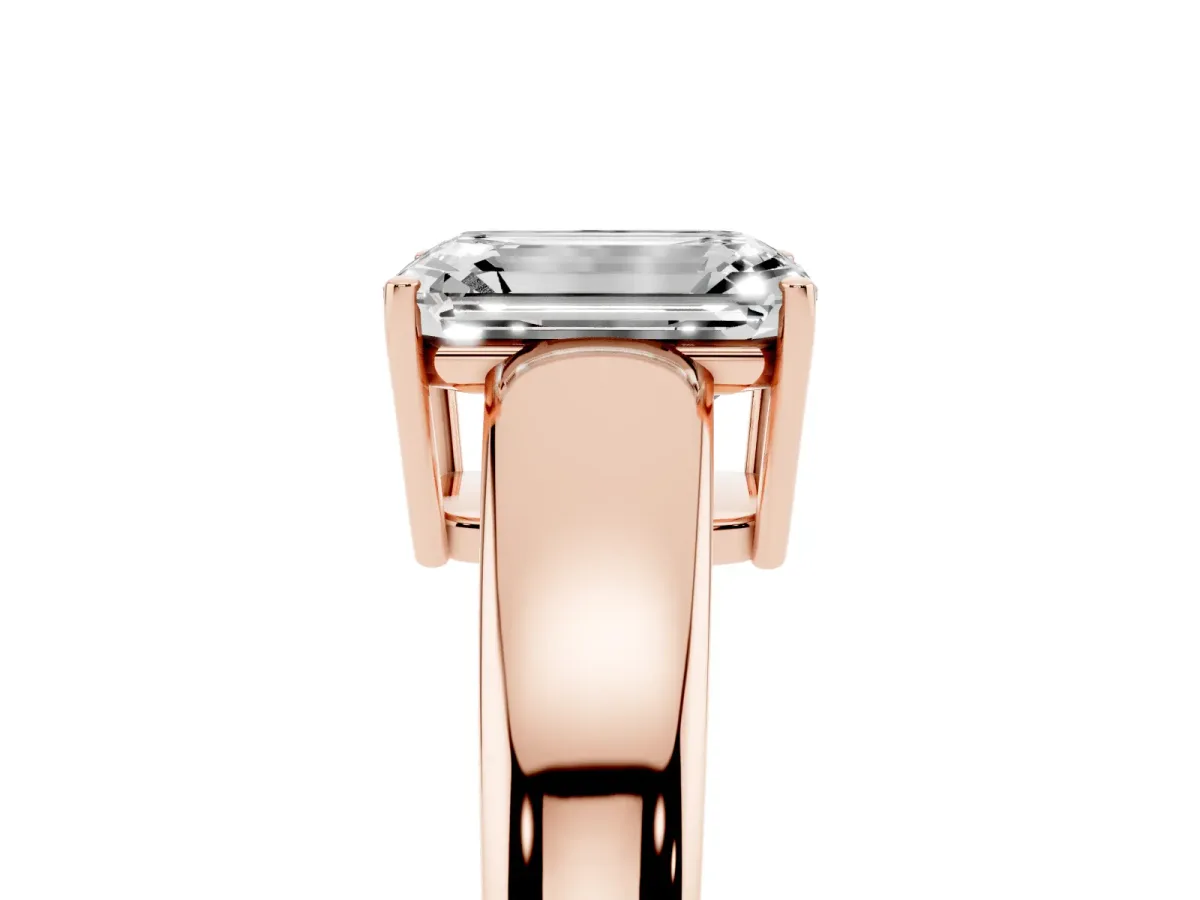 Emerald Cut Solitaire Diamond Ring with Tapered Band and Four-Prong Setting Rose gold